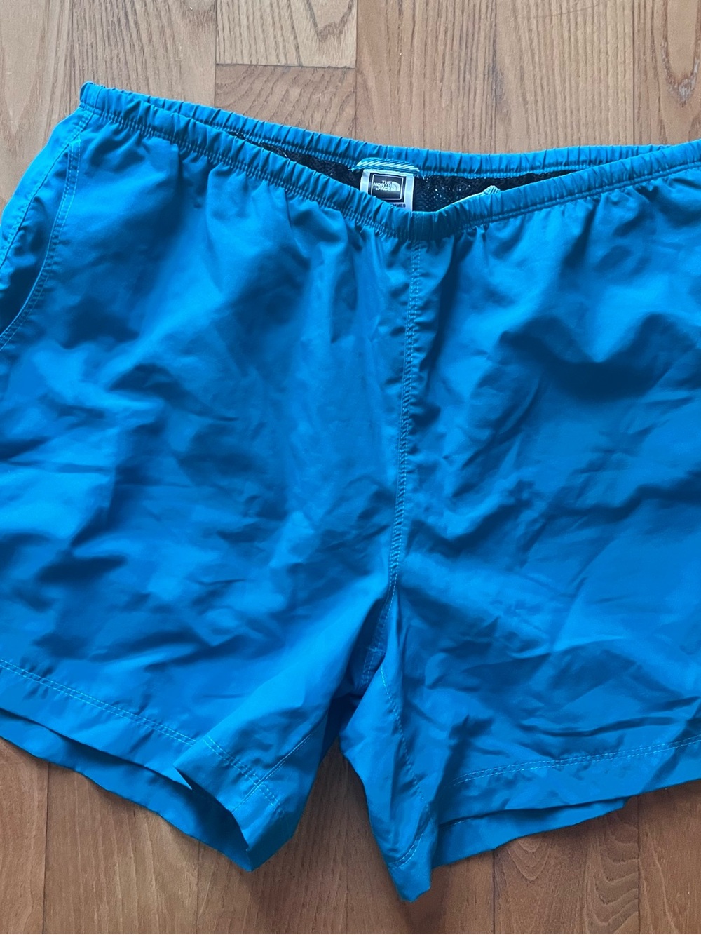 The North Face womens running shorts size medium green